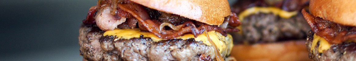 Eating Burger Hot Dog at Primo Burgers restaurant in Tehachapi, CA.